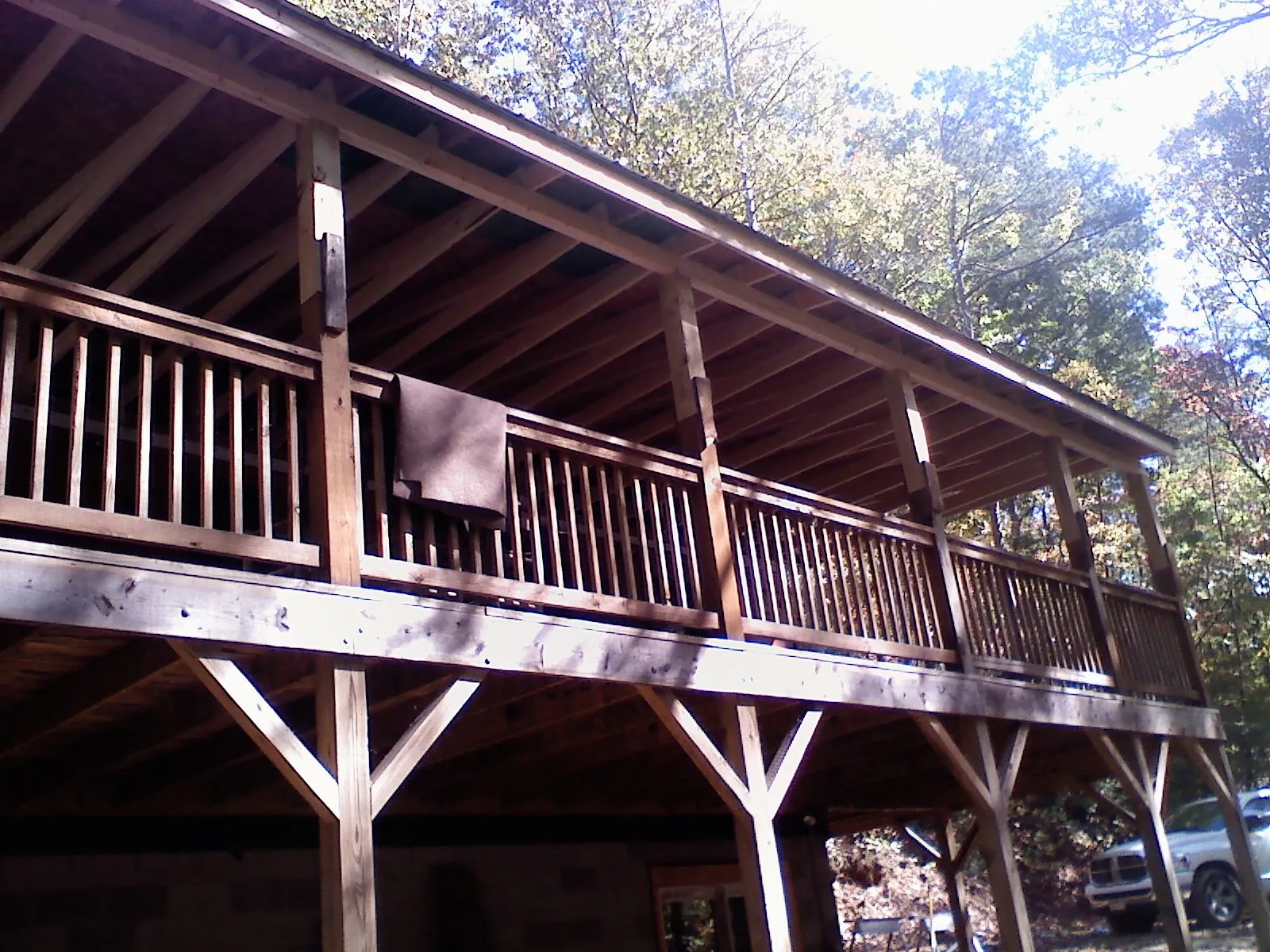 Timber framing under a new elevated porch and deck — Roof Leak Repair in Vanderbilt by Roofing Brothers